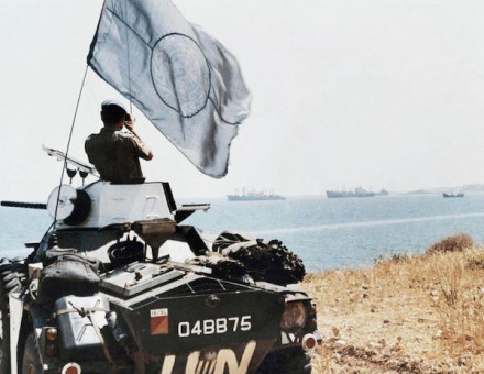 A United Nations trooper observes Turkish ship movements near Karavas, Cyprus, 4 August 1974. Associated Press/Alamy Stock Photo.