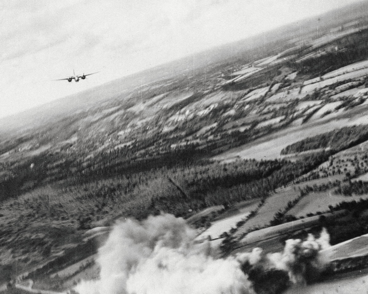 An attack by the Lorraine squadron on the Mûr-de-Bretagne transformer station near Guerlédan, Brittany, 26 August 1943. Mirrorpix.