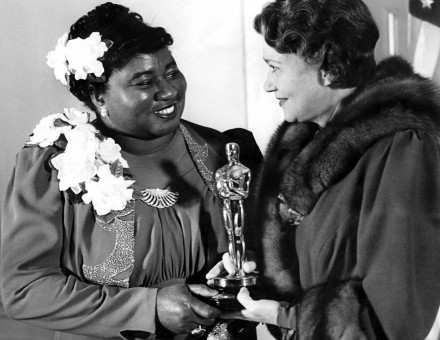 McDaniel receives her Oscar from actor Fay Bainter, 1940. Alamy.