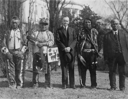 President Calvin Coolidge with Native American delegates, possibly of the Yakama Nation, at the White House, 1925. Library of Congress. Public Domain.